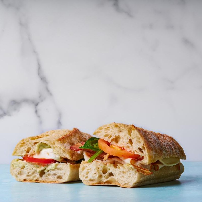 Two halves of a panini sandwich