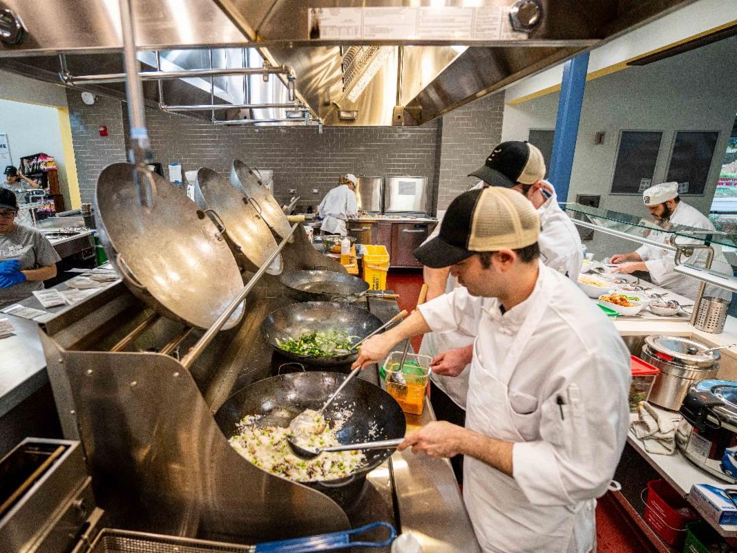 Chefs cooking at Latitude Restaurant