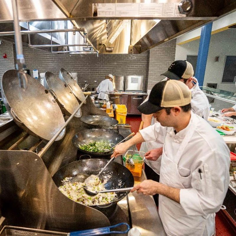 Chefs cooking at Latitude Restaurant