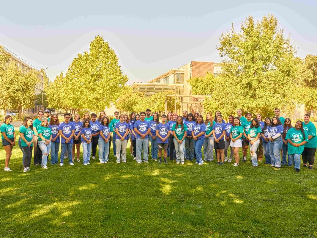 First Year Experience Staff stands in the Segundo residence area. 
