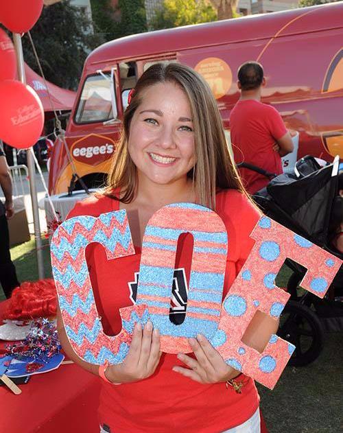 student with COE letters