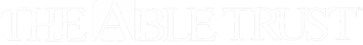 The Able Trust Logo Horizontal White.png