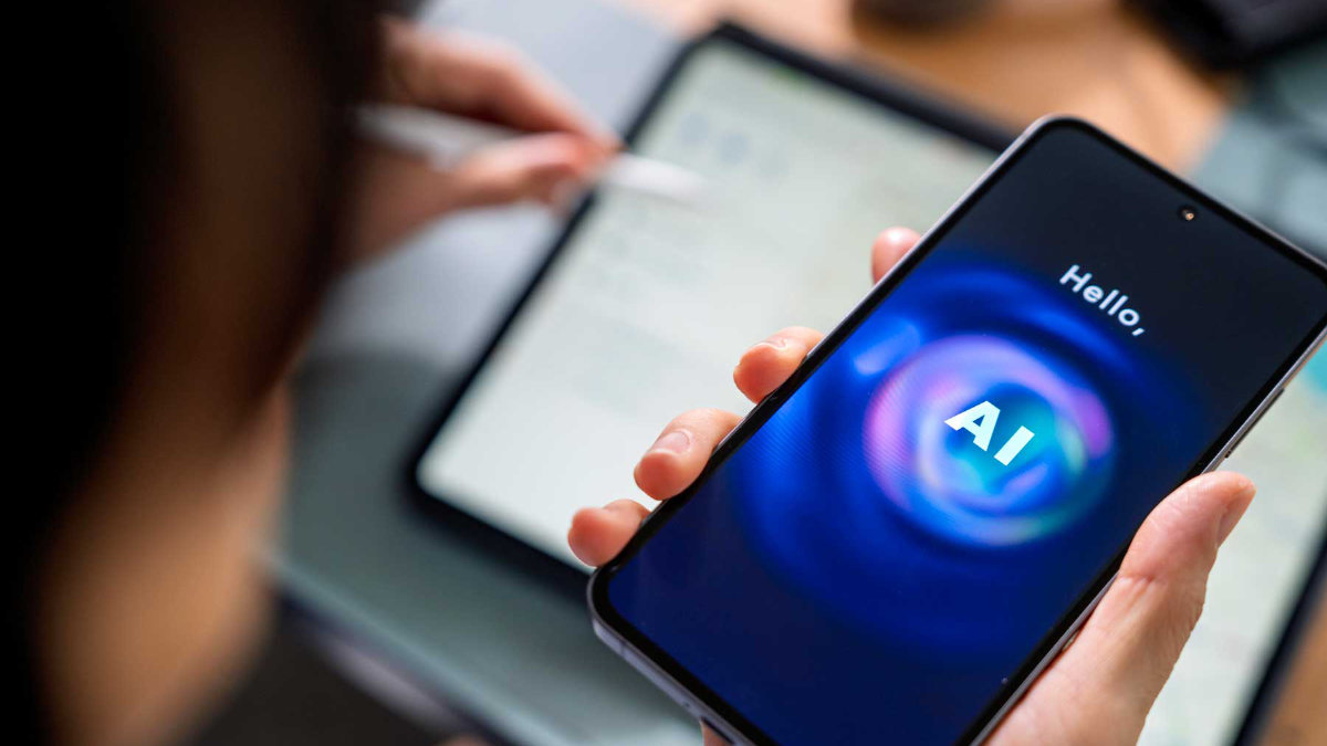 A man uses AI on his cell phone.