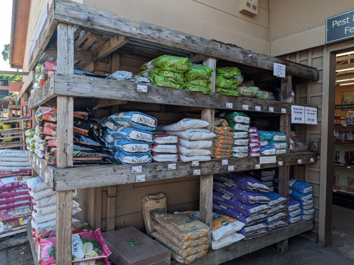 bags of planting mixes at a garden center
