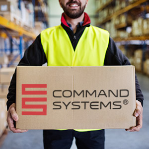 Worker holding box with Command Systems Logo