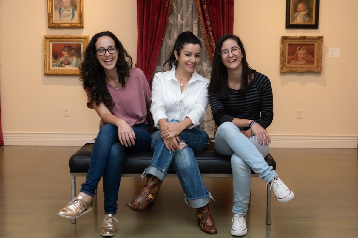 Museum visitors posing