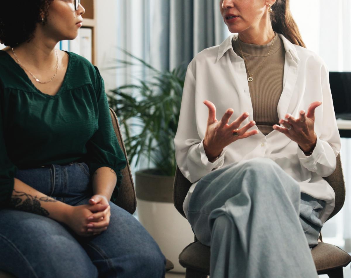Two people talking.