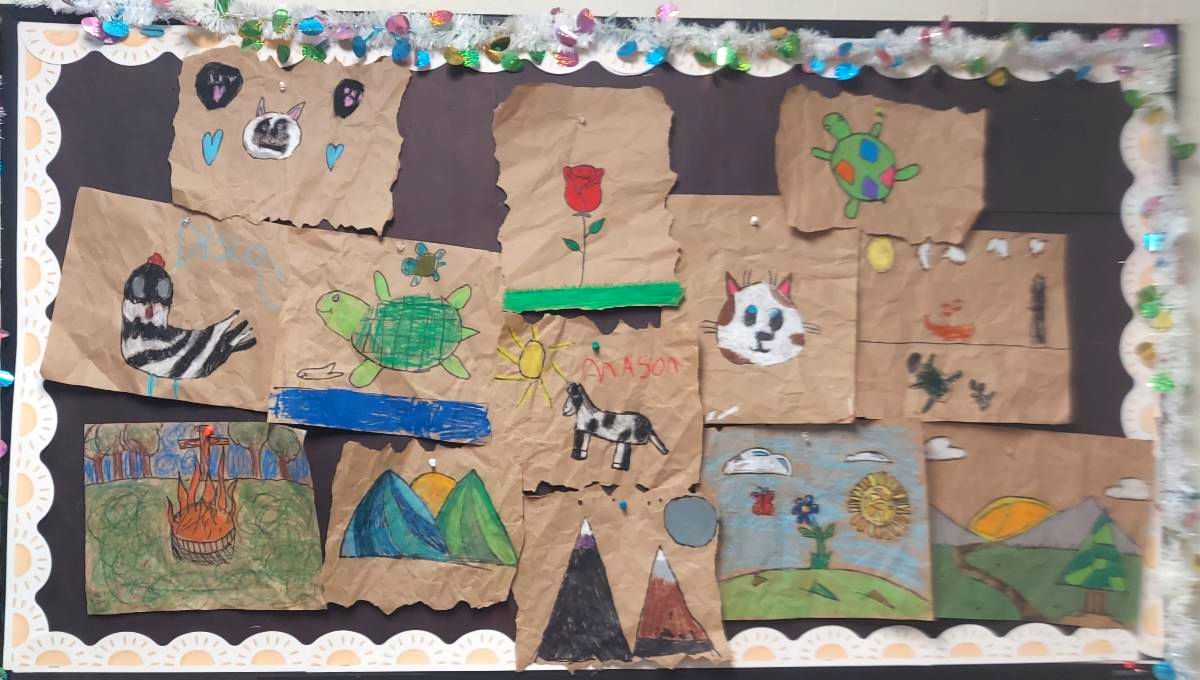 Bulletin board display of  papel amate home school art projects