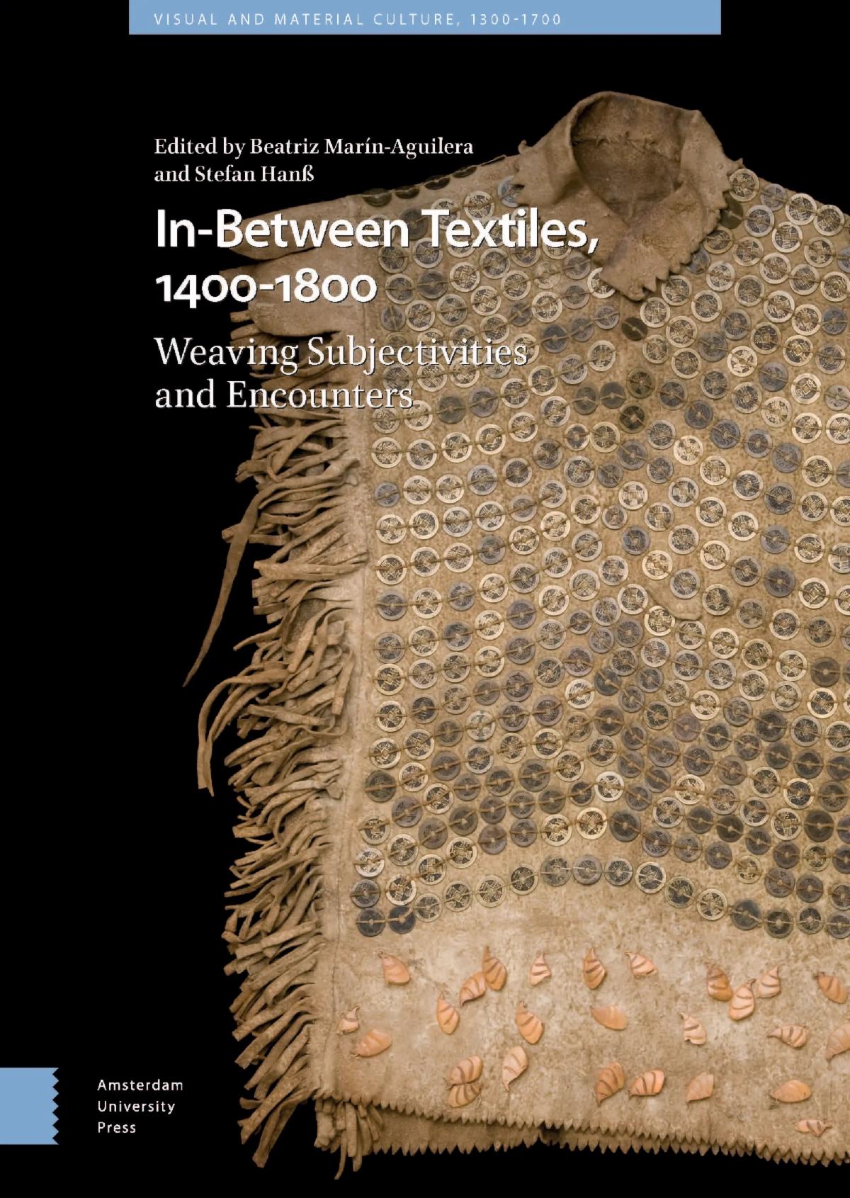 a book cover with text and tan shirt with fringe and attachments