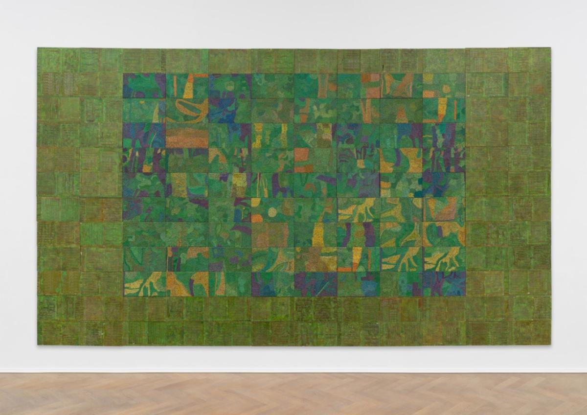 A smaller rectangle within a larger rectangle of electronic material, including twisted colorful wires and circuitboards