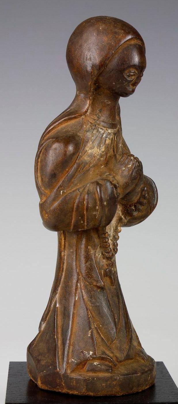 Madonna figure blending Luba and European aesthetics c 1930 Mpala DRC