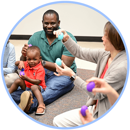 Teacher and Family with Egg Shakers