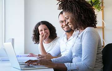 A person mentoring volunteers