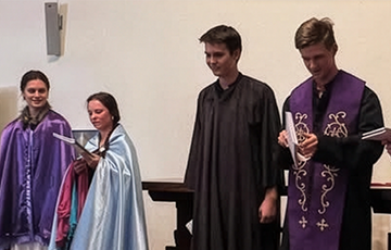 Youth leading a worship service
