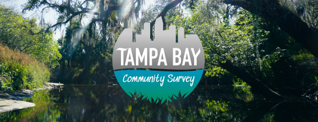 A lushly vegetated blackwater river with the Tampa Bay Community Survey logo overlay