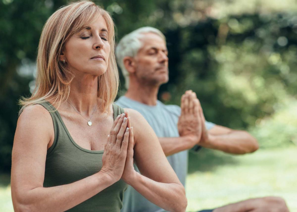 couple who has successfully lost weight using Tirzepatide doing yoga