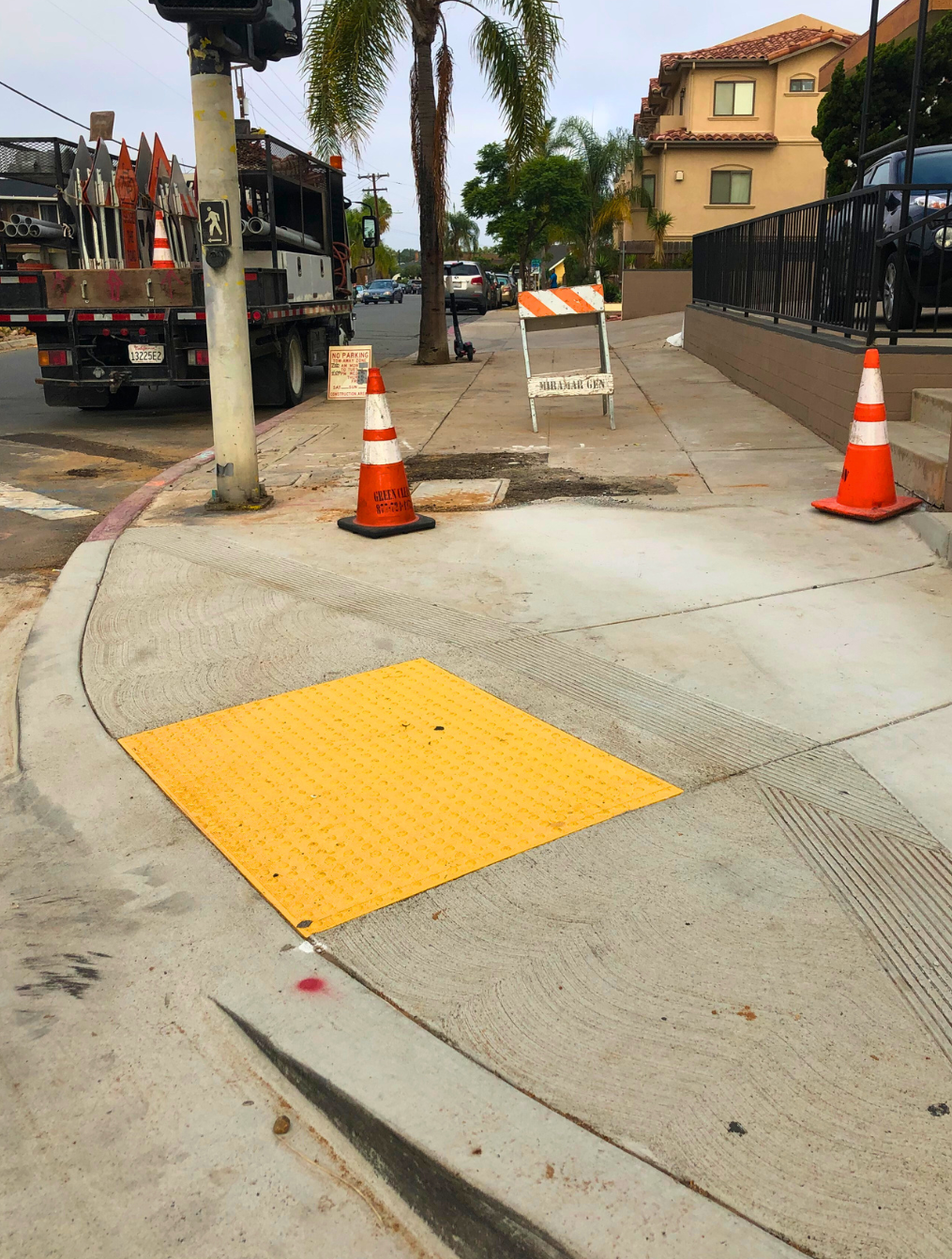 Recently upgraded curb ramp to meet ADA accessibility.