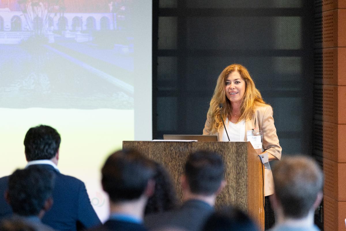 Assistant Department Director Elif Cetin presenting at recent event.