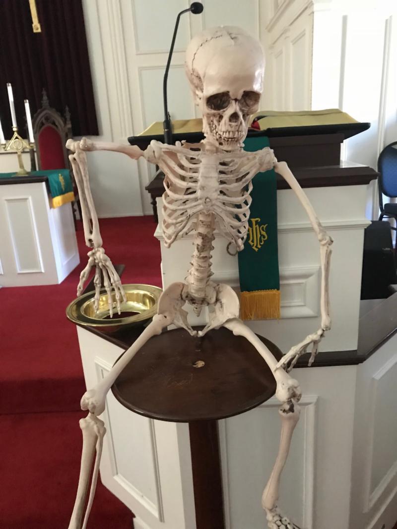 Skeleton by pulpit