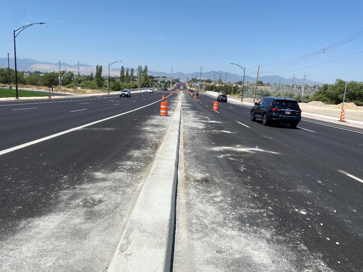 Crews are placing the finishing touches on the median curb on 9000 South near 700 West. 