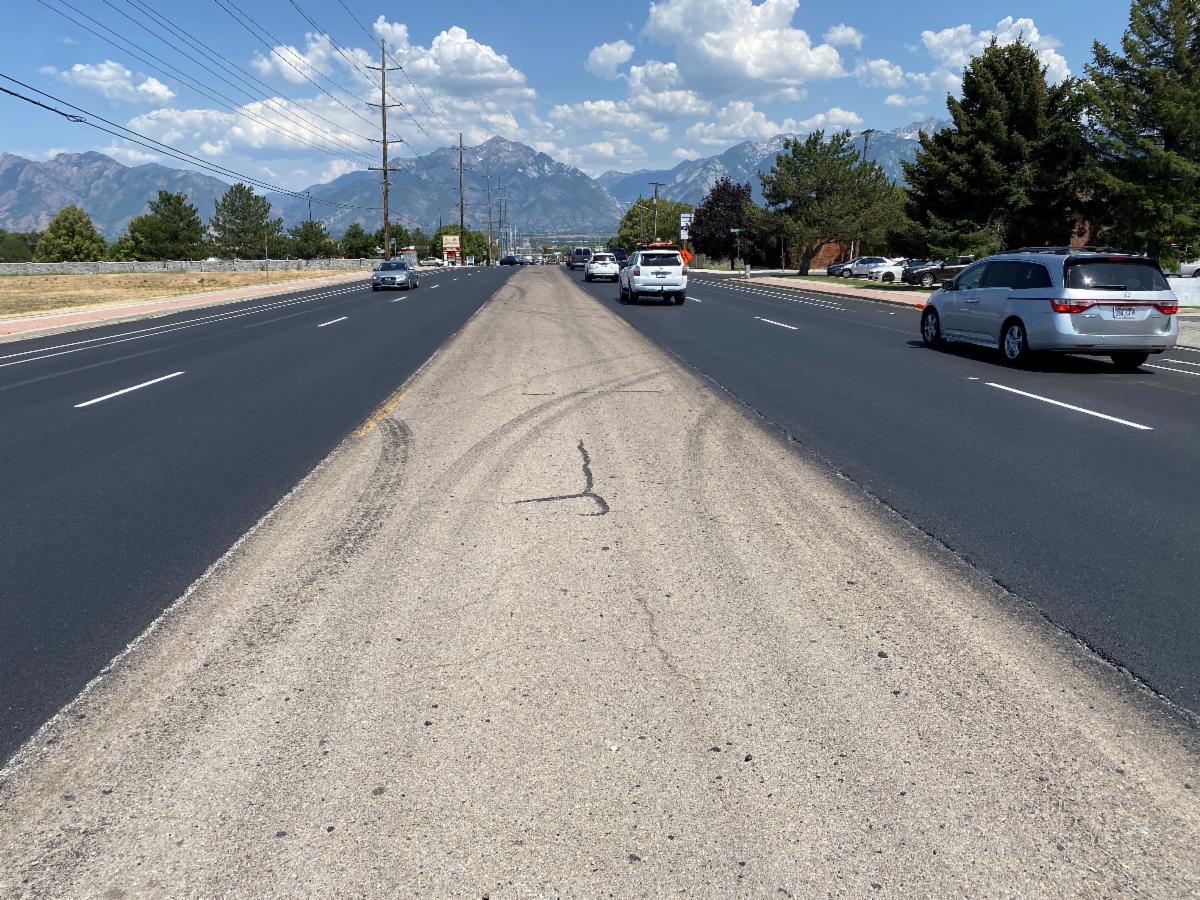 Crews have removed and replaced most of the asphalt on 9000 South between Redwood Road and Bangerter Highway. Only a few sections in the middle of the road remain. 