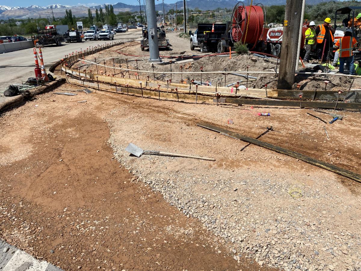 Crews working to complete the concrete curb and gutter on 700 West prior to placing the asphalt. 