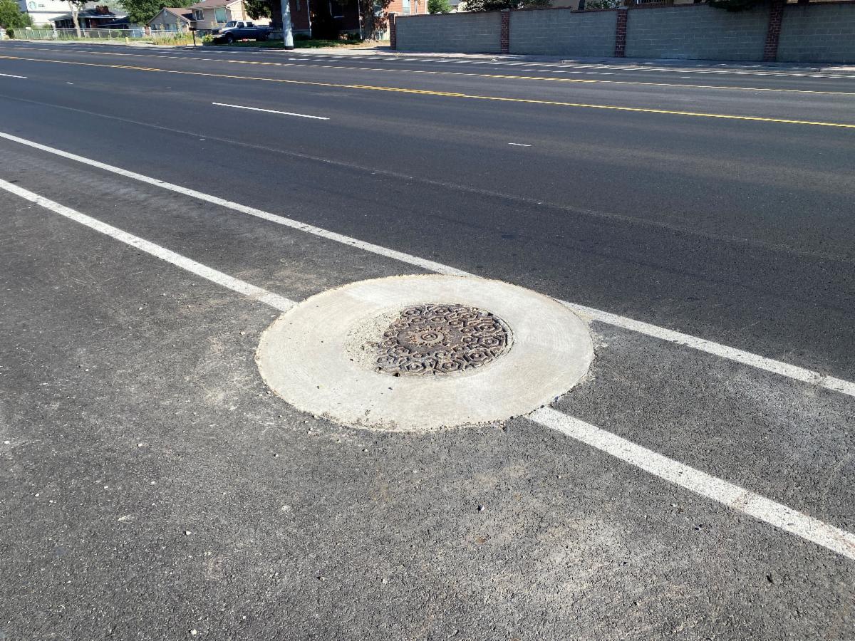 Crews are finishing raising utility lids and will finish installing the grooved in lane lines prior to the July 24 holiday. 