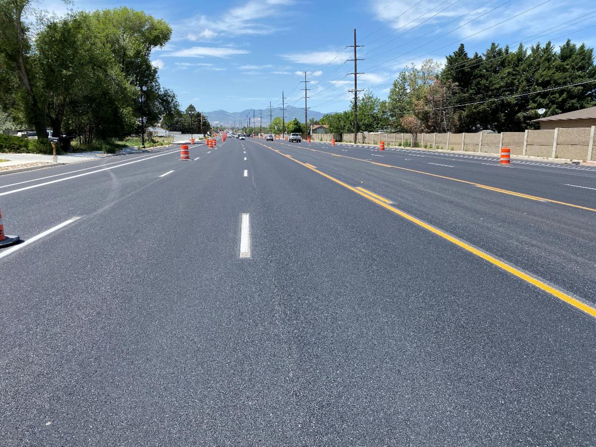 Crews have completed all paving for this project and need a couple more weeks to finish lane striping. This project widened nearly 1.5 miles of road from two lanes in each direction to three.
