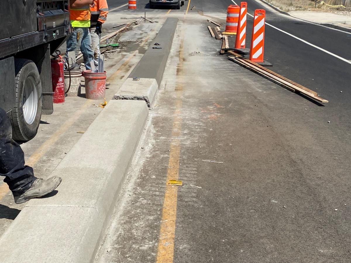 Crews are placing the finishing touches on the median curb on 700 West north of 9000 South. 