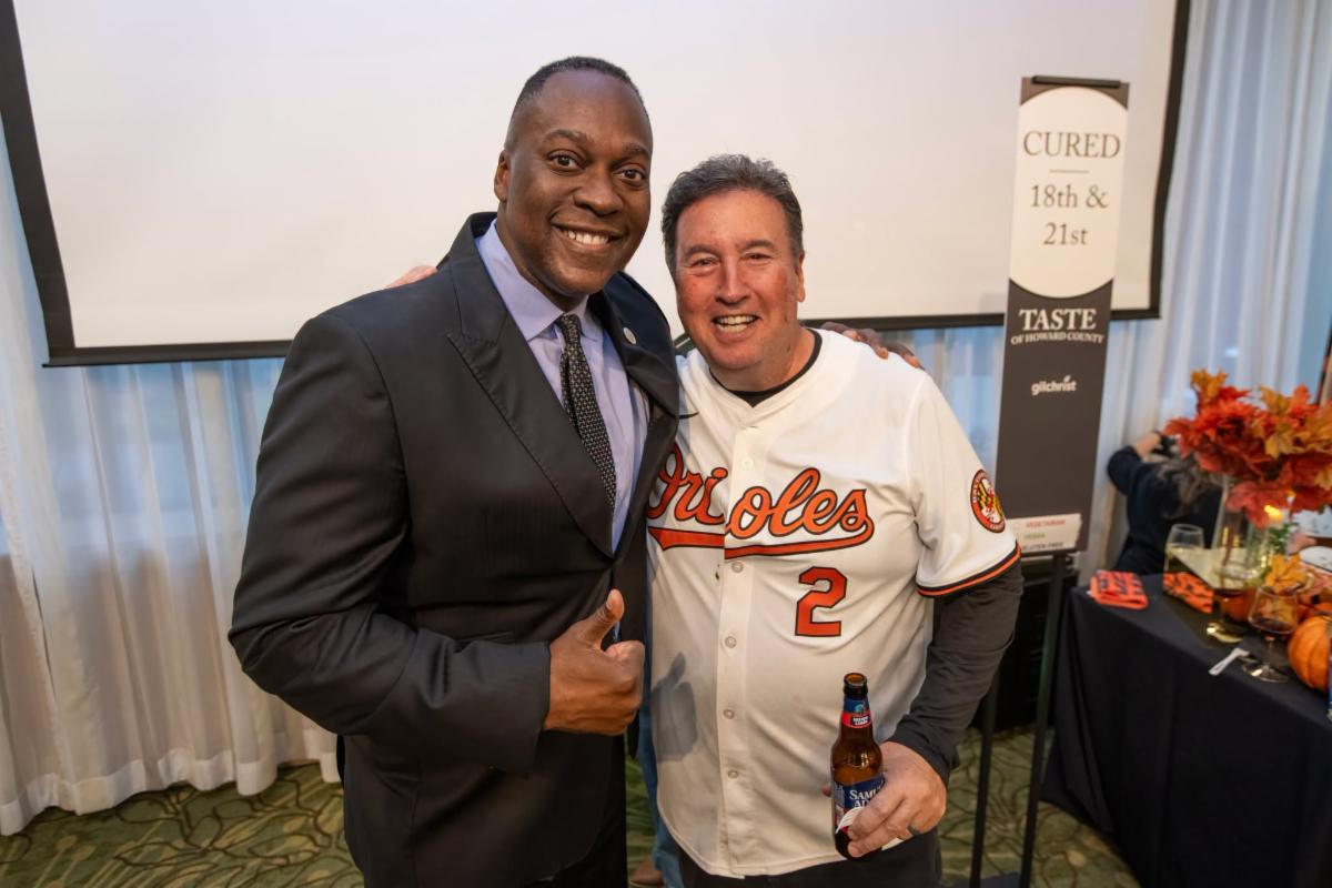 County Executive Calvin Ball at the Taste of Howard County posed for a photo with event emcee Jamie Costello.