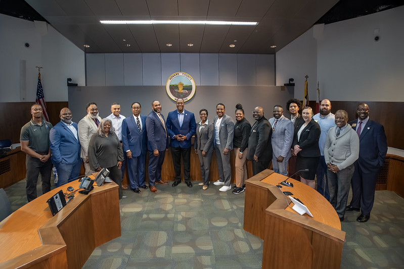 A photo of County Executive Calvin Ball with members of the County's new Youth Engagement Strategy (YES!) Council.