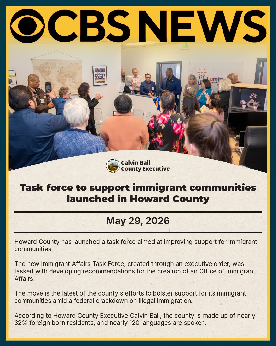 Graphic with a photo of County Executive Calvin Ball at Luminus Network for New Americans' office in Columbia with a text blurb from a CBS News article âTask force to support immigrant communities launched in Howard County.
