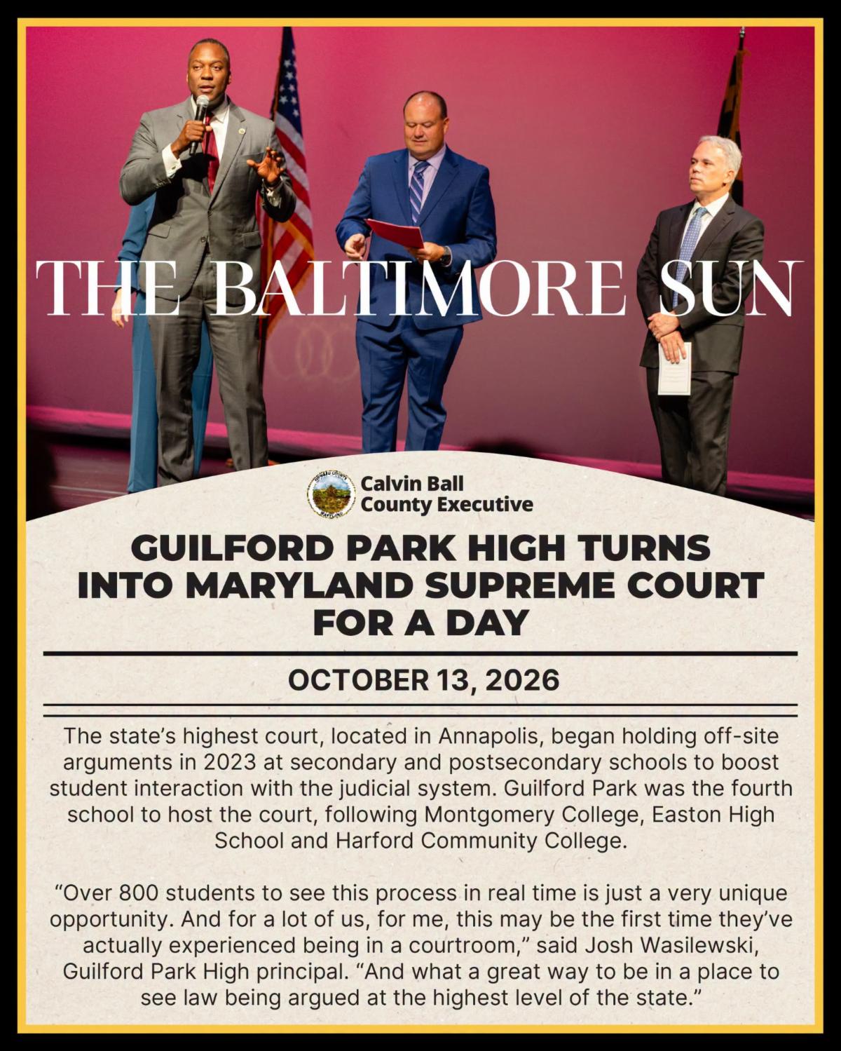 Graphic with photo of County Executive holding a mic on stage at Guilford Park High School with Superintendent Bill Barnes and Chief Justice Matthew Fader next to him and text from The Baltimore Sun article about the Maryland Supreme Court at the school.
