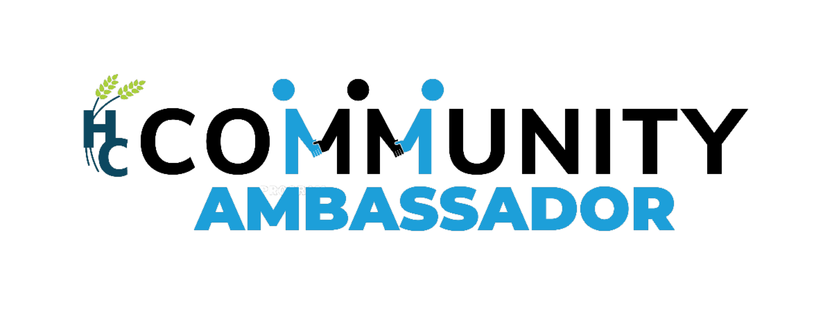 Logo for Howard County's Community Ambassador Program containing an H and a C with two wheat stalks going through the letters and the text Community Ambassador to the right. The M's in Community are made to be two figures shaking hands.