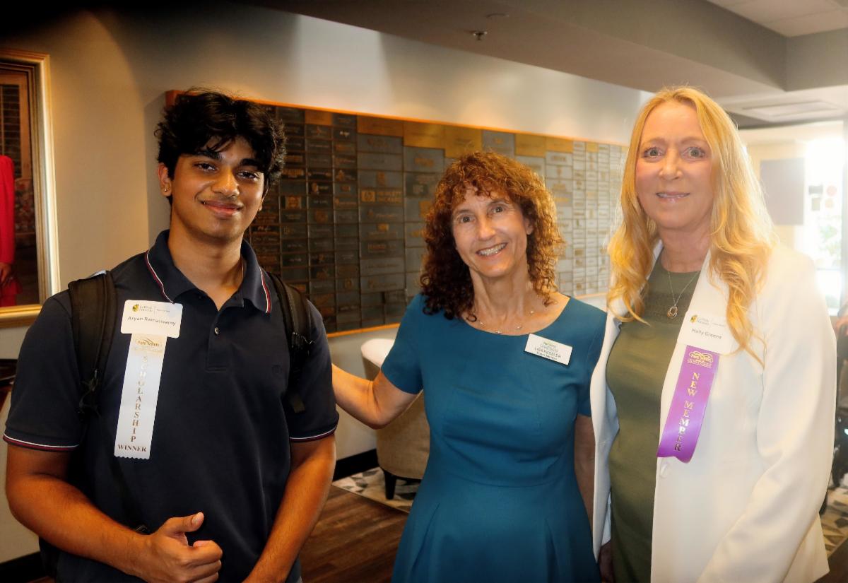 Lisa with scholarship recipient and staff emeritus