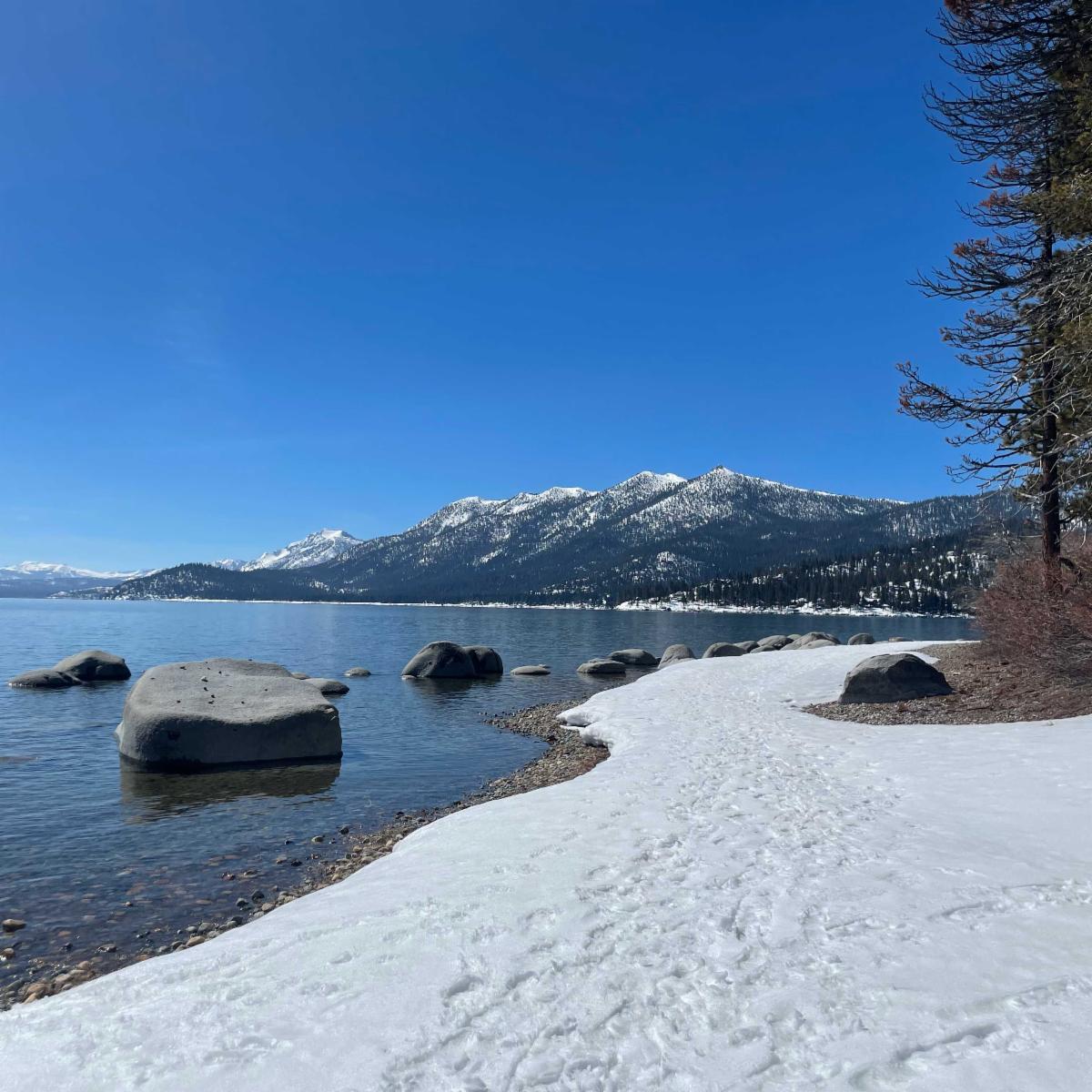 A snowy Lake Tahoe shore.