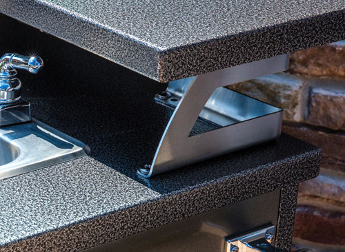 Raised bar top for an outdoor kitchen