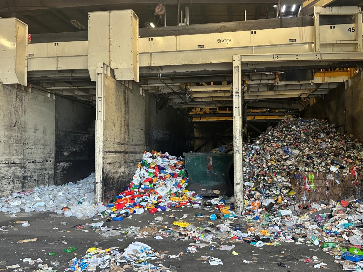 plastic materials sorted into three stalls at Pioneer Recycling