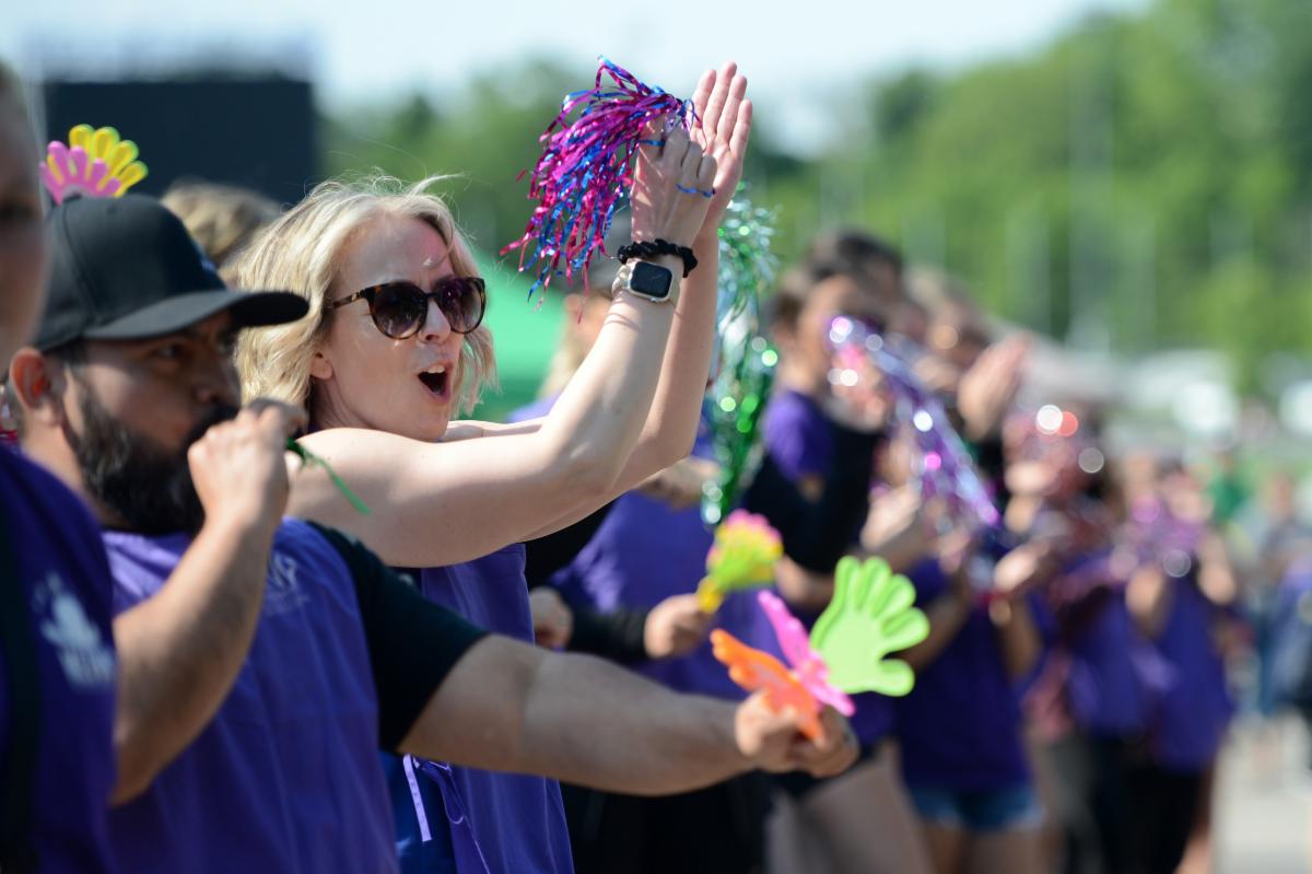 People applaud at the Special Olympics
