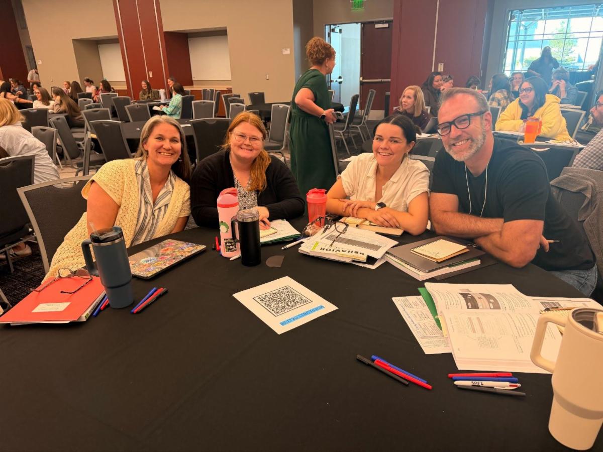 Photo 4 of participants at a table at the 2026 Behavior Support and Prevention Summit  