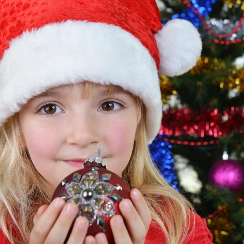 girl_by_christmas_tree.jpg
