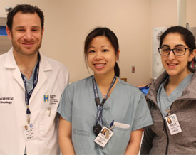  From left, Dr. Peter Stotland with surgical resident Dr. Natalie Wong-Chong and clinical clerk Gilly Akhatar-Denesh 