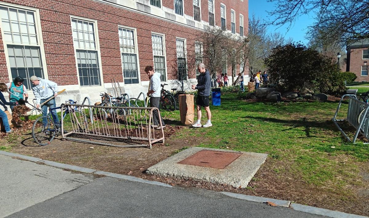 Photo of Alpha Tau Omega brothers gardening