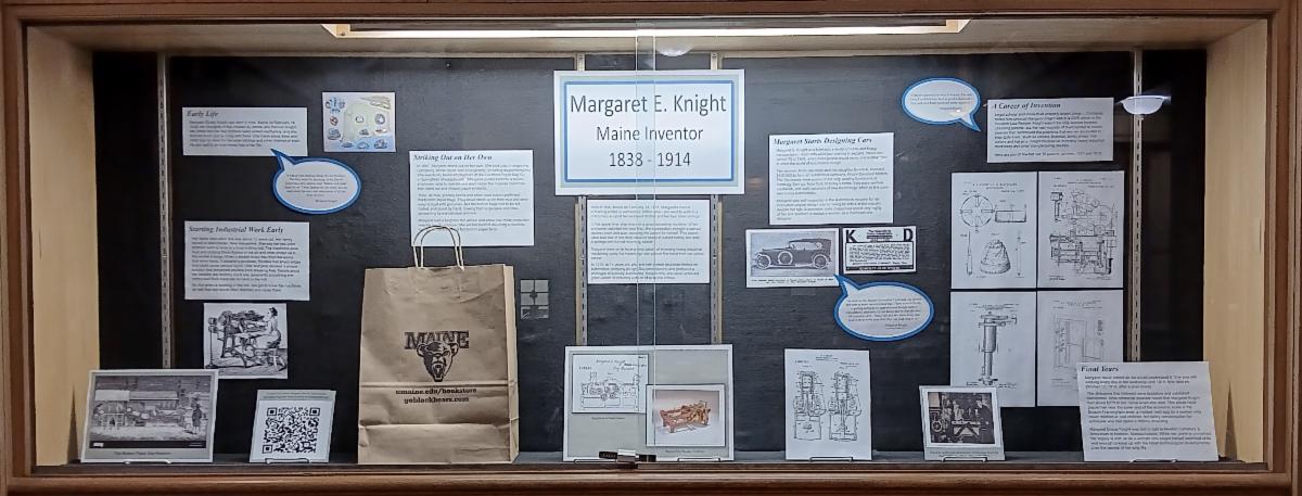 Photo of a display case containing narratives and drawings about the inventions of Margaret E. Knight.