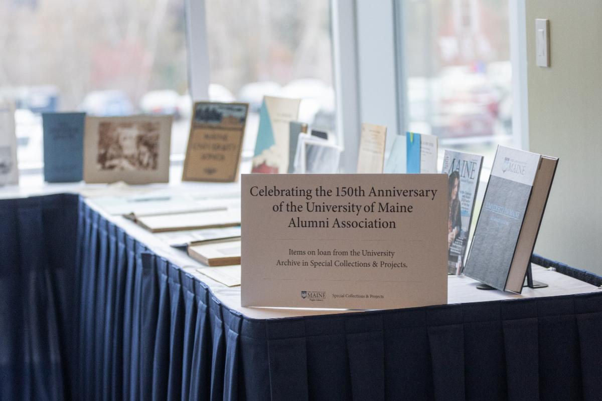 Books and other items on display at Alumni Association event