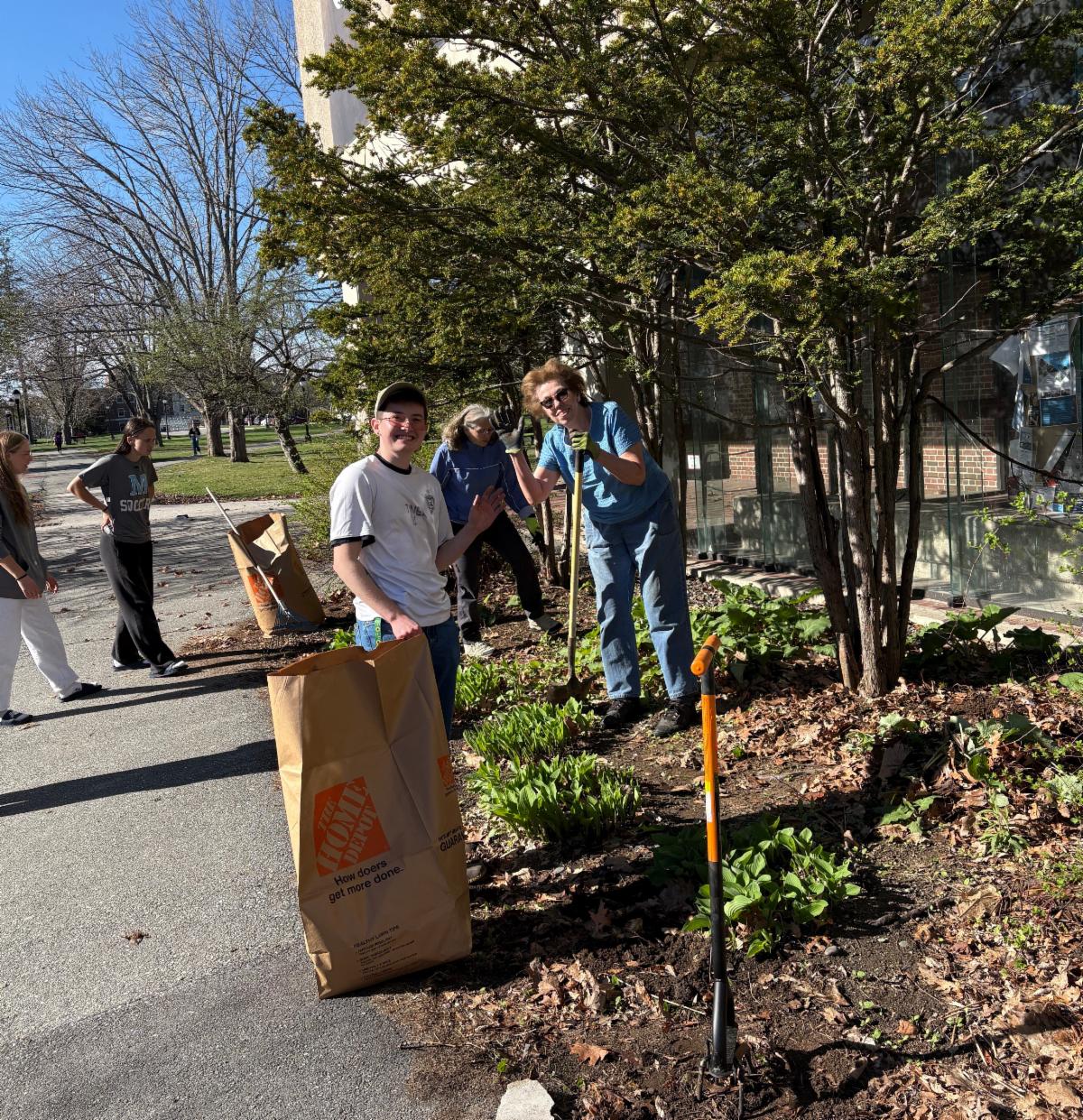 Photo of Lincoln Tiner  Dianne Paradis and Rosie Seaber gardening