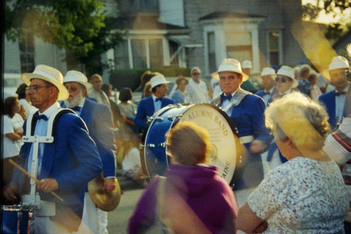 Color photo of the UMaine Alumni Band performing in a parade in Biddeford in 1995.