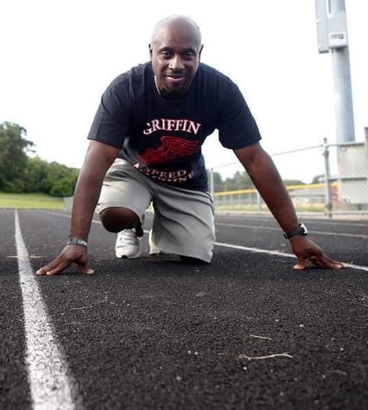 picture of Coach Orlando Green on the field