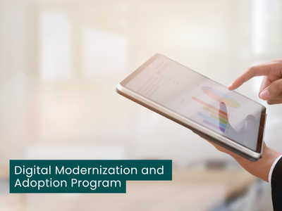 A photo of a hand holding a tablet. Text reads Digital Modernization and Adoption Program.