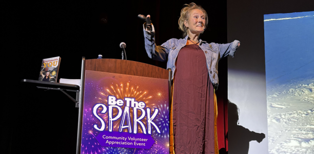 keynote speaker “Unstoppable” Tracy Schmitt giving a presentation on stage